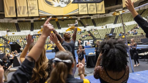 Freshman Hannah Horton after finishing her vault with a 9.85 at gymnastics Black and Gold Exhibition.